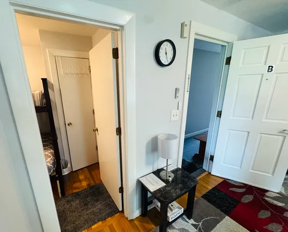 a view of a couches and table in a kitchen