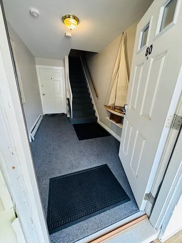 a view of a hallway with staircase