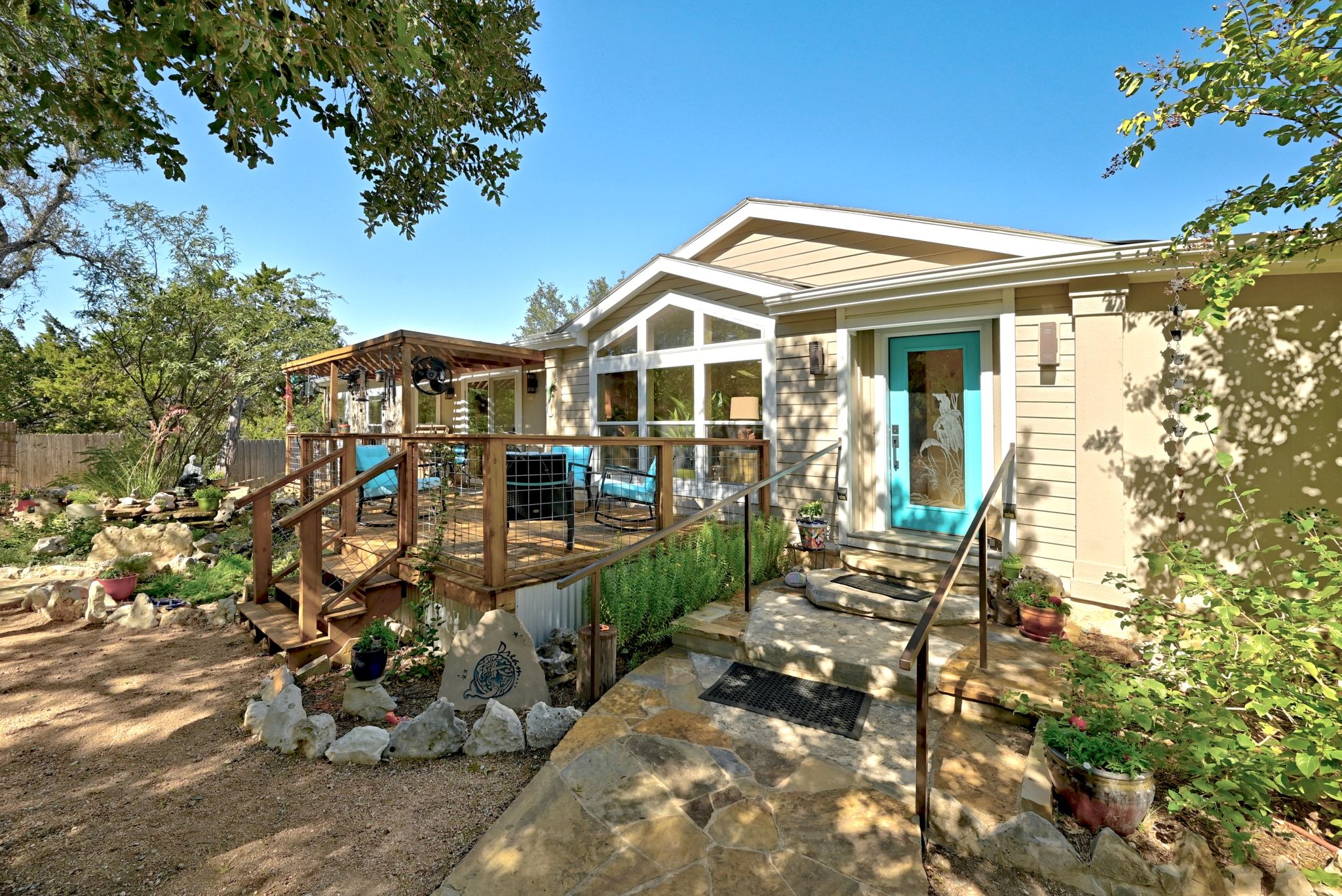 120 Cedar Bend Road Wimberley, TX 78676 - Photo 7 of 40 a view of a small yard in front of a house