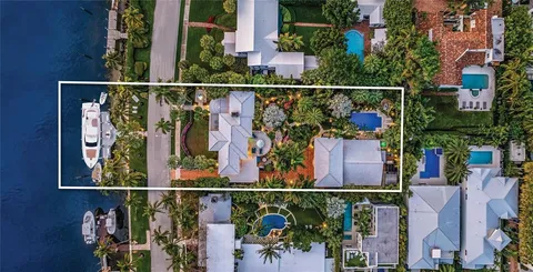 a view of a water in front of a house