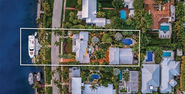 a view of a water in front of a house