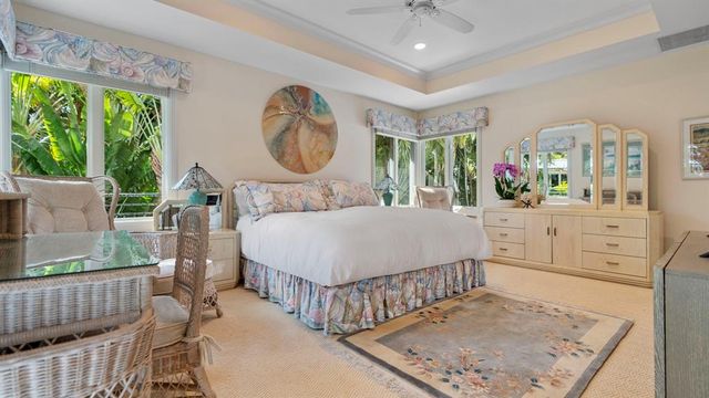 a view of swimming pool with outdoor seating