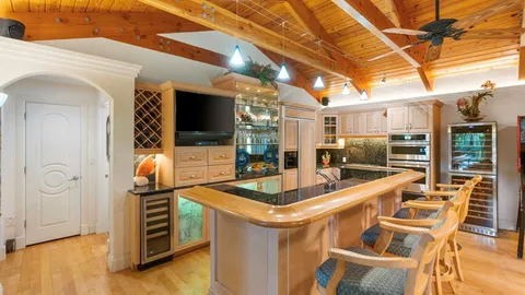 a room with lots of furniture and windows