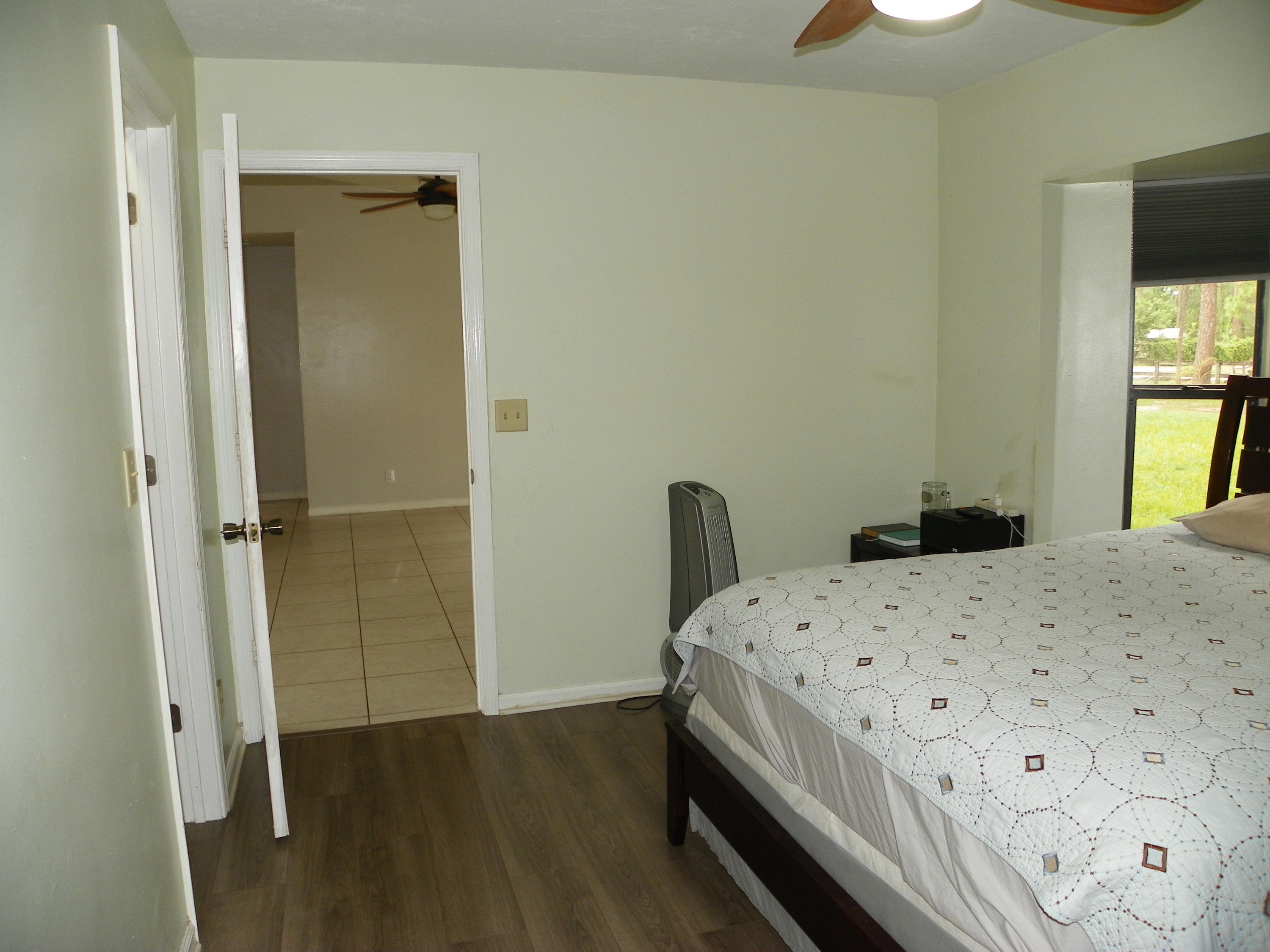 14898 85th Road North Loxahatchee, FL 33470 - Photo 32 of 49 Master Bedroom