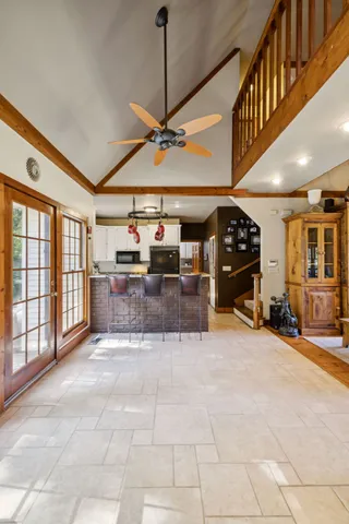a kitchen with stainless steel appliances granite countertop a stove sink and cabinets