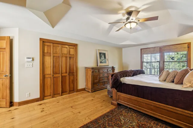 a kitchen with a sink and large window