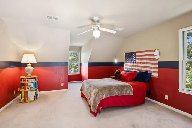 a view of living room with furniture and window