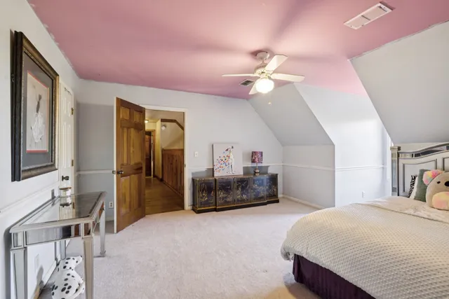 a view of a livingroom with furniture and front door