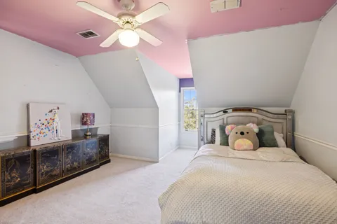 a view of a porch with chairs and backyard