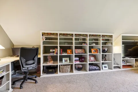 a view of a porch with wooden floor and outdoor space