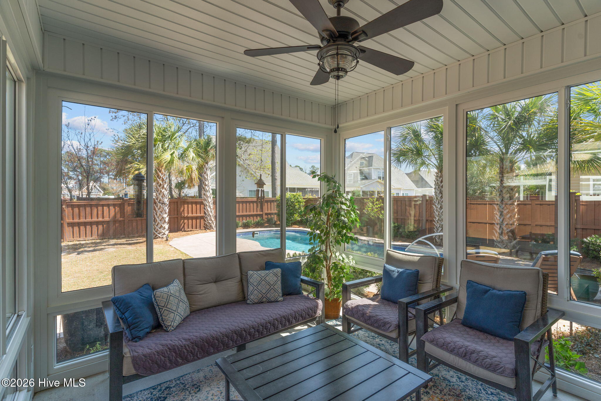 6134 Tarin Road Wilmington, NC 28409 - Photo 37 of 50 Sunroom downstairs off kitchen/family room