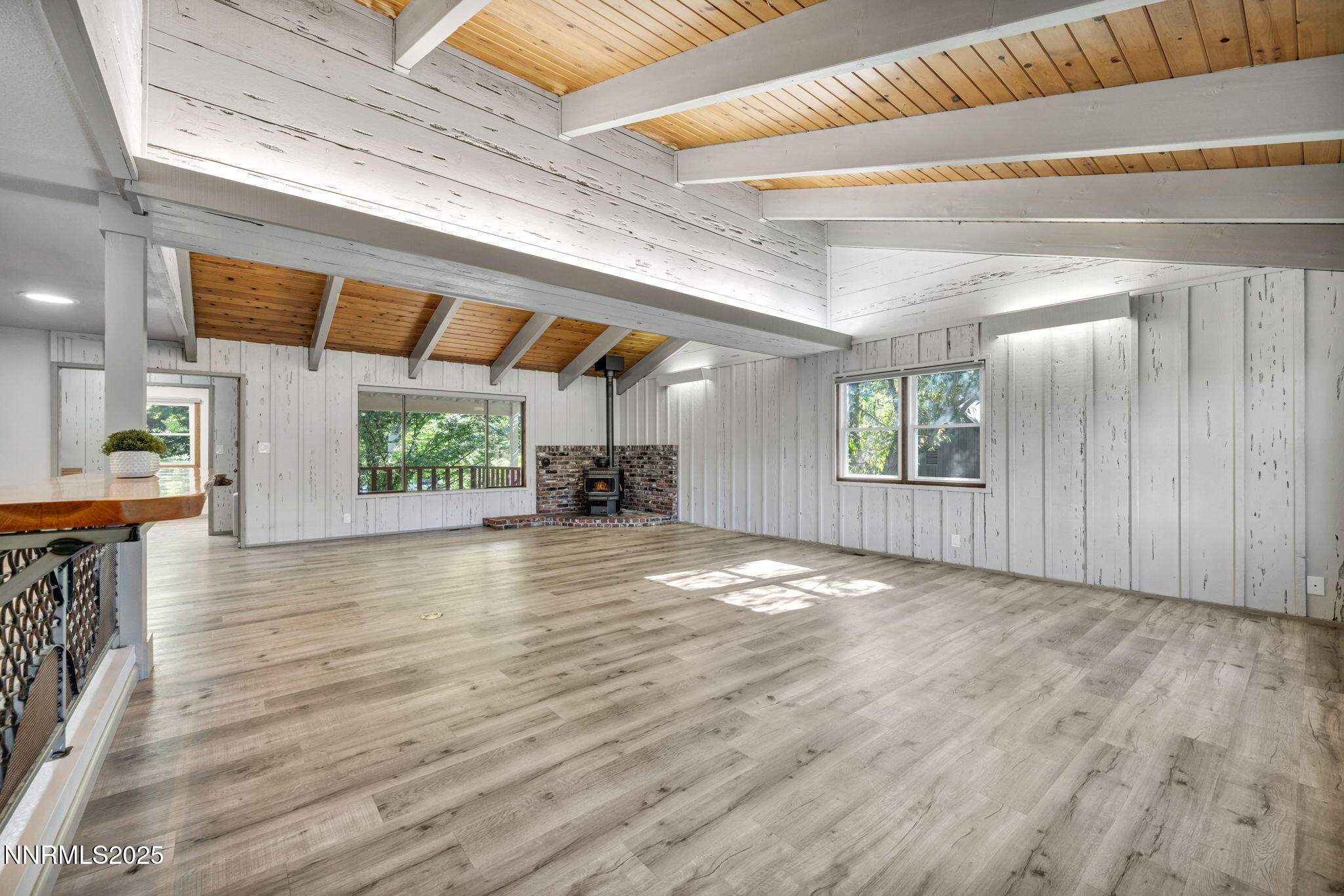 1478 Clough Road Reno, NV 89509 - Photo 11 of 32 a view of empty room with wooden floor