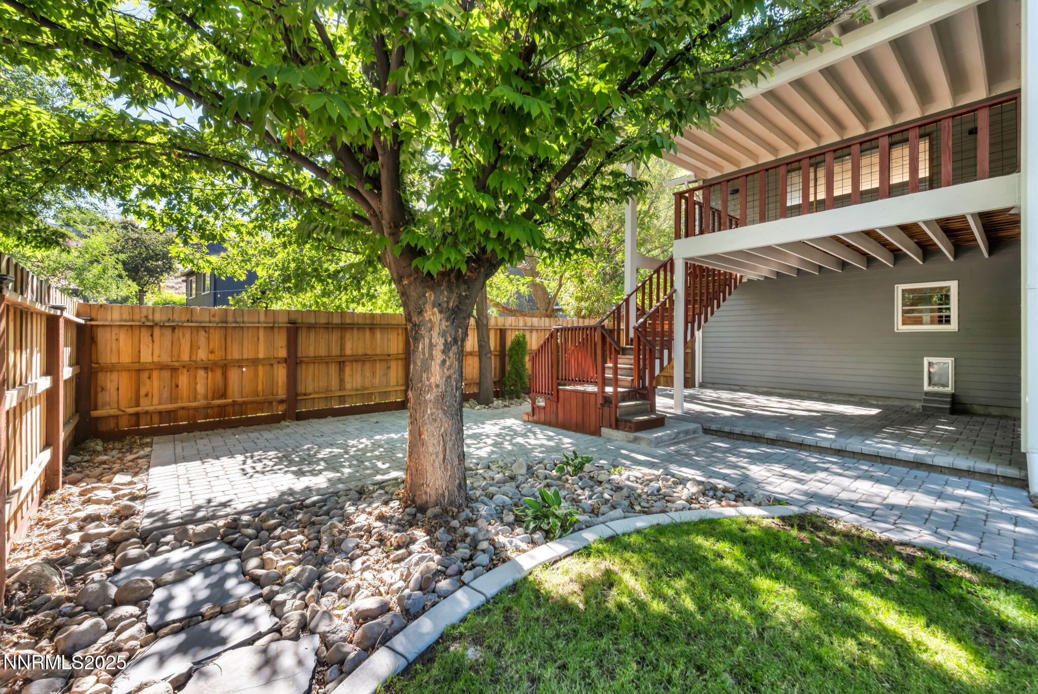 1478 Clough Road Reno, NV 89509 - Photo 29 of 32 a view of a backyard with a tree