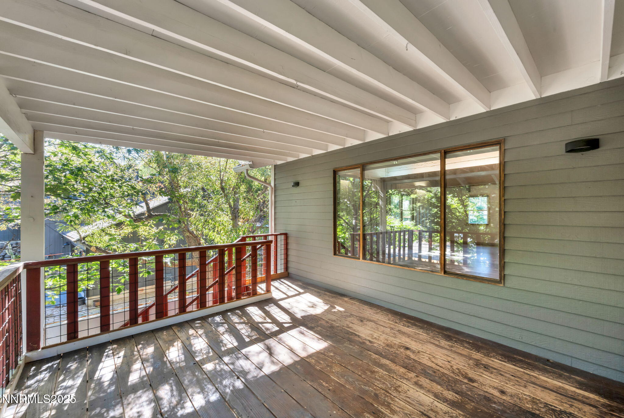 1478 Clough Road Reno, NV 89509 - Photo 32 of 32 a view of a porch with wooden floor and outdoor space