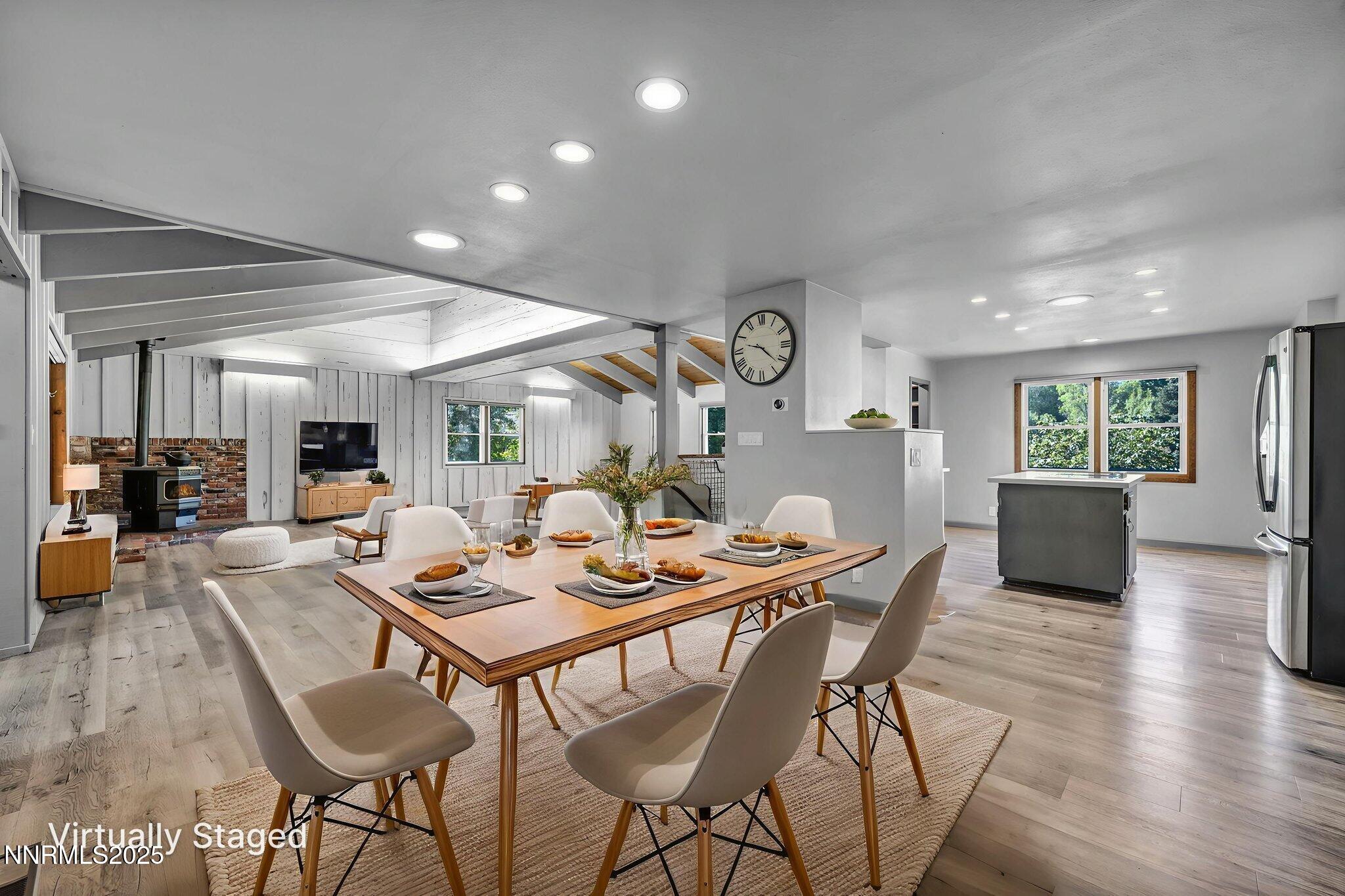 1478 Clough Road Reno, NV 89509 - Photo 4 of 32 a dining room with furniture and wooden floor