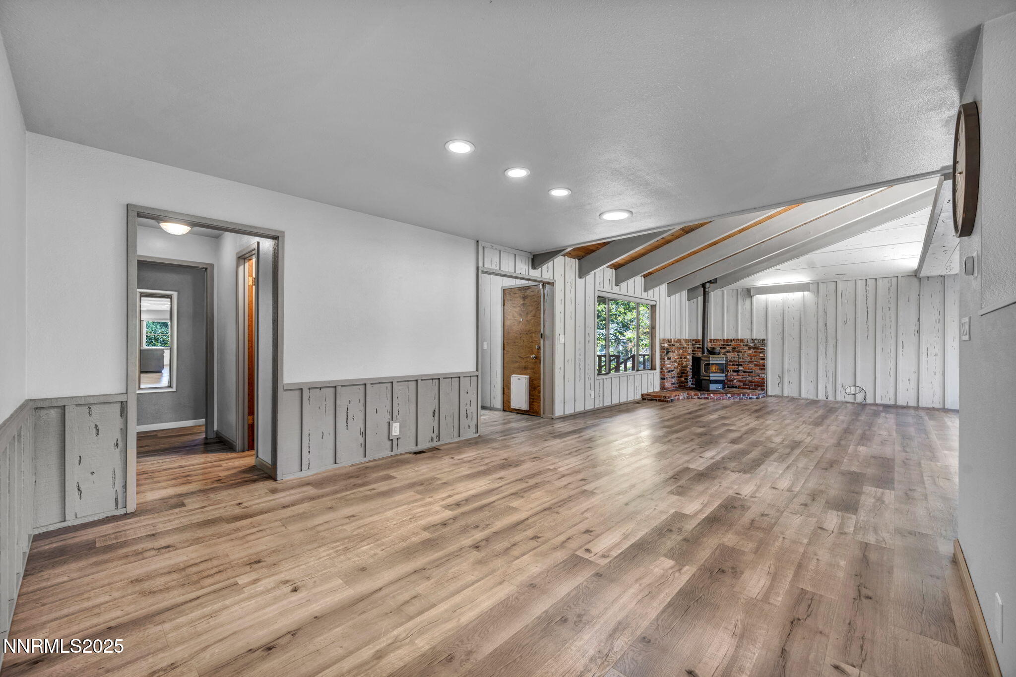 1478 Clough Road Reno, NV 89509 - Photo 6 of 32 a view of empty room with wooden floor