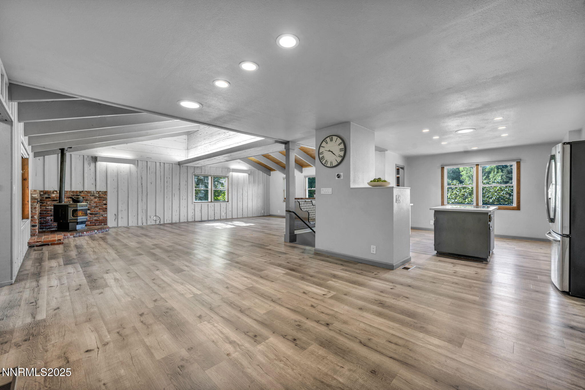 1478 Clough Road Reno, NV 89509 - Photo 7 of 32 a view of a livingroom with furniture and wooden floor