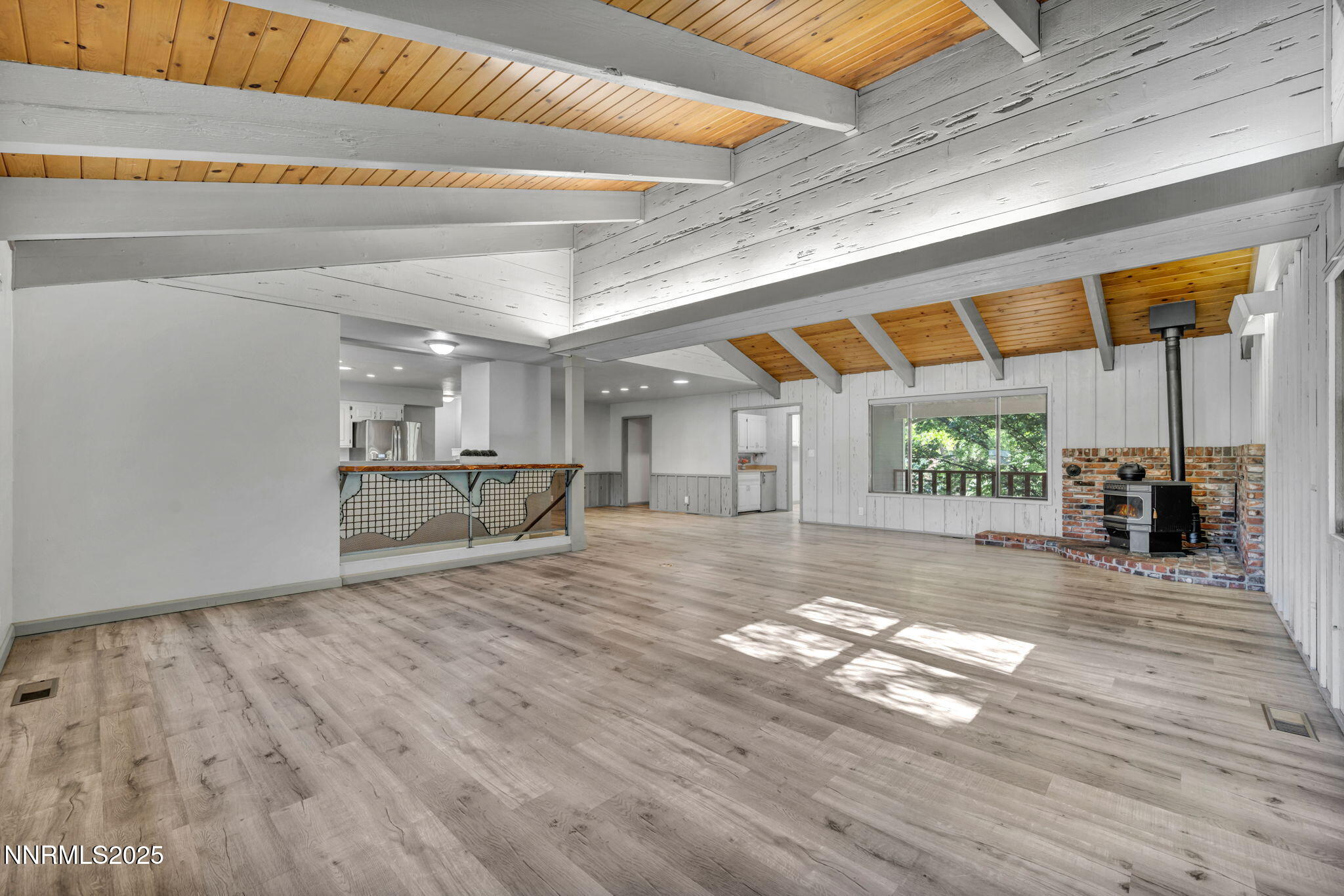 1478 Clough Road Reno, NV 89509 - Photo 10 of 32 a view of a room with wooden floor