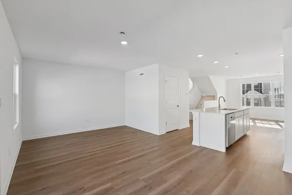 a view of kitchen and wooden floor