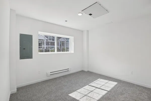 an empty room with windows