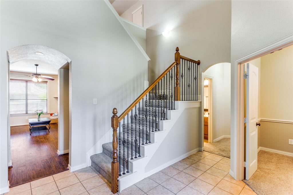 400 Commonwealth Drive Saginaw, TX 76179 - Photo 21 of 32 a view of entryway and hall with wooden floor