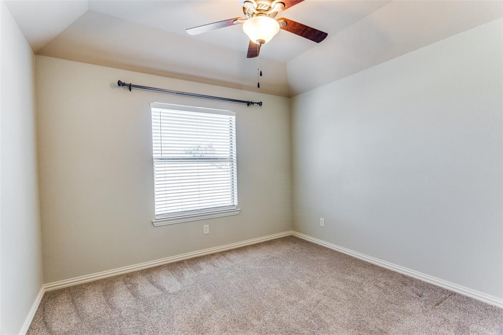 400 Commonwealth Drive Saginaw, TX 76179 - Photo 24 of 32 a view of an empty room with a window