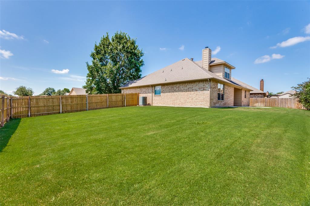 400 Commonwealth Drive Saginaw, TX 76179 - Photo 27 of 32 a house view with a play ground in front of it