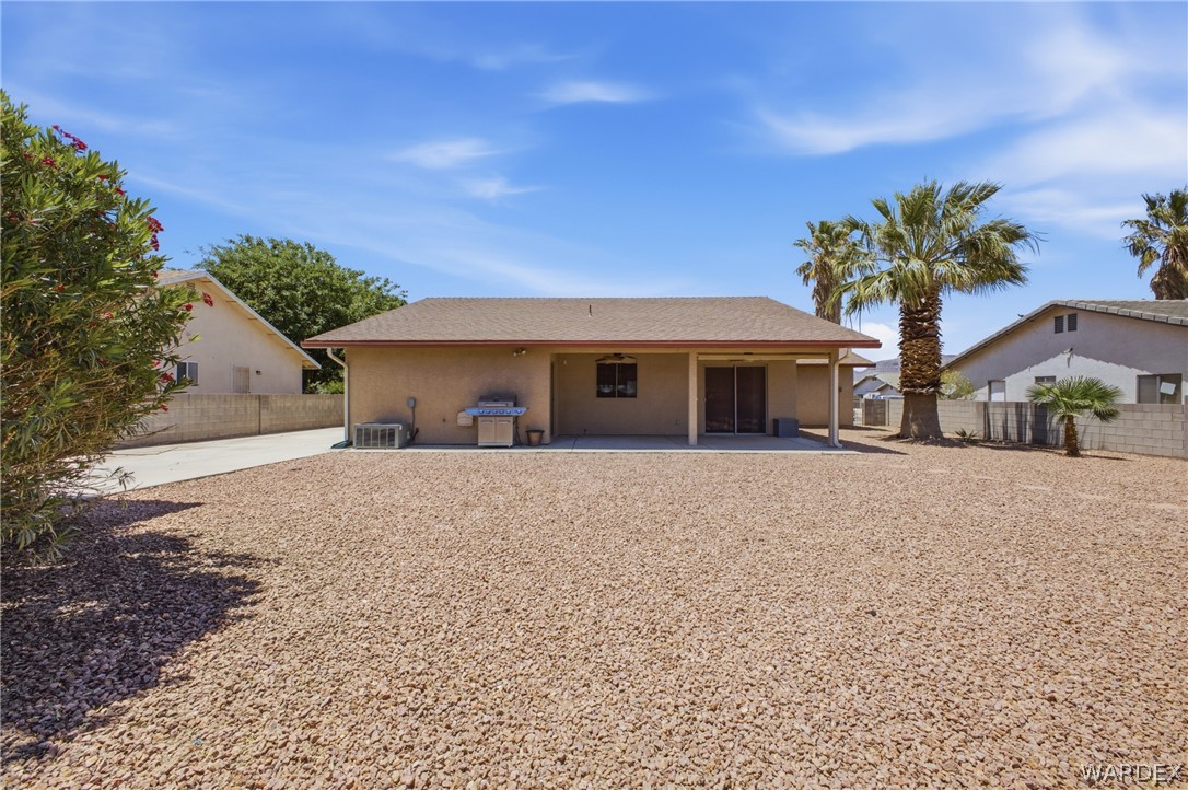 3918 North Eagle Rock Road Kingman, AZ 86409 - Photo 38 of 44 front view of a house with a yard