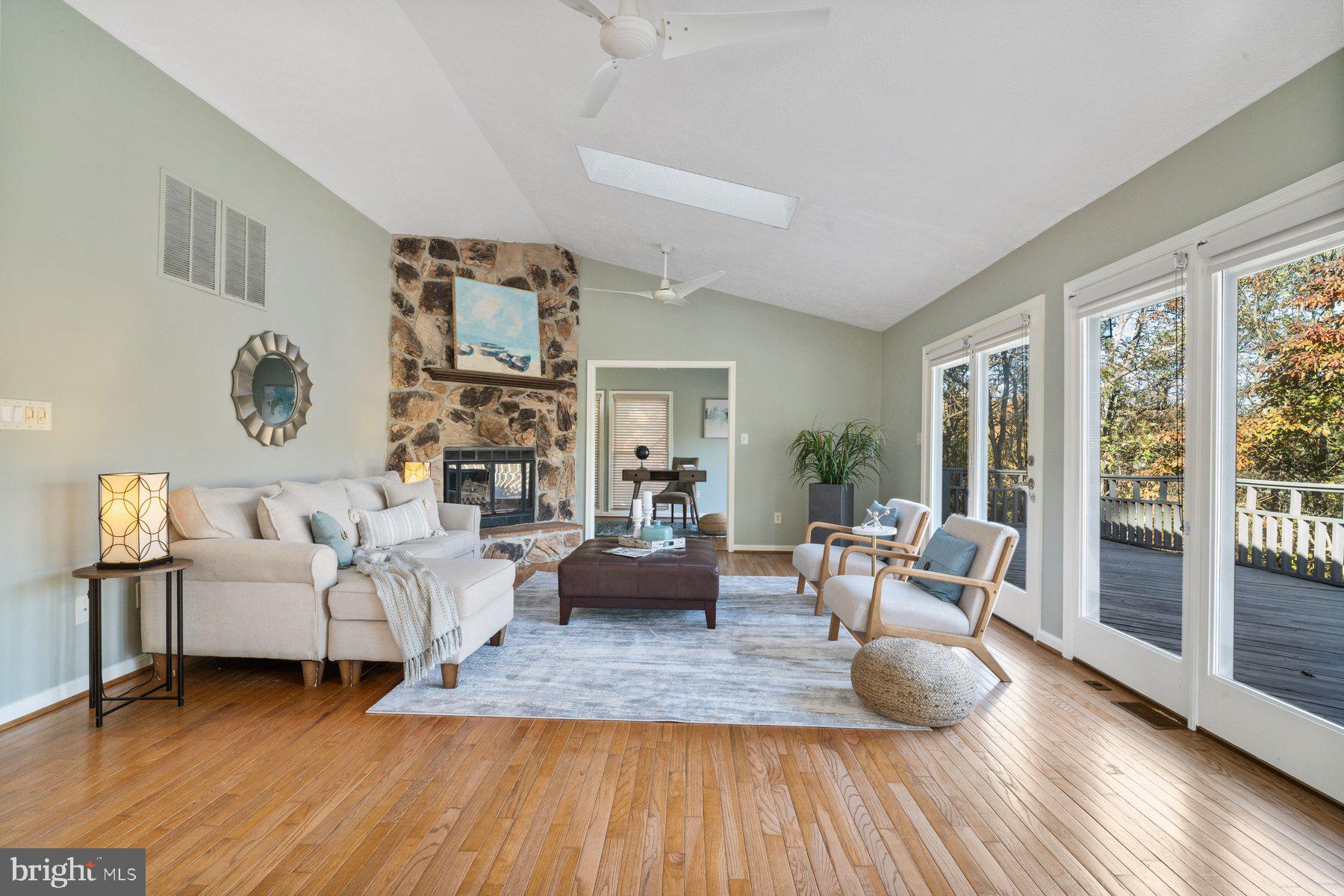 6949 Meadowlake Road New Market, MD 21774 - Photo 16 of 51 Unwind by the beautiful stone fireplace.