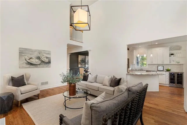 a view of a dining room with furniture and window
