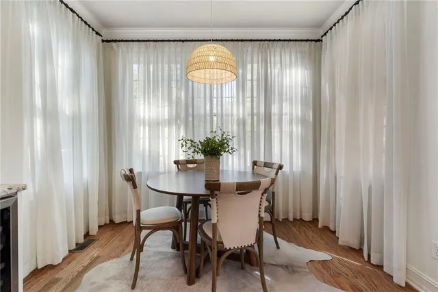 a kitchen with granite countertop a sink stove and refrigerator