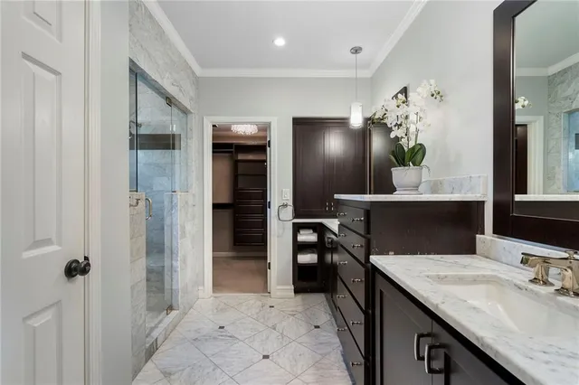 a bathroom with a window and a shower