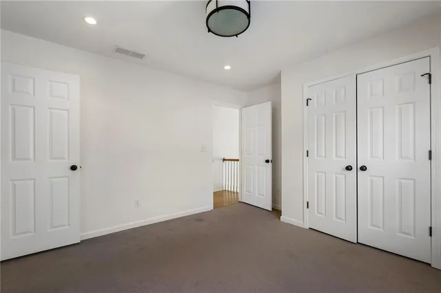 a view of balcony with wooden floor and fence