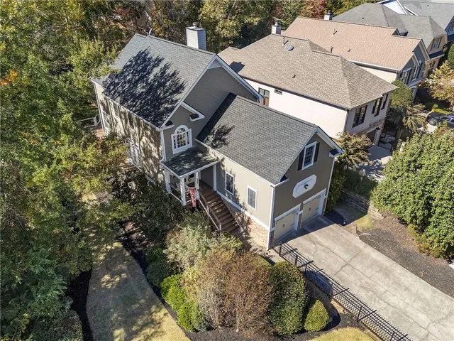 a view of an entryway with wooden floor and windows