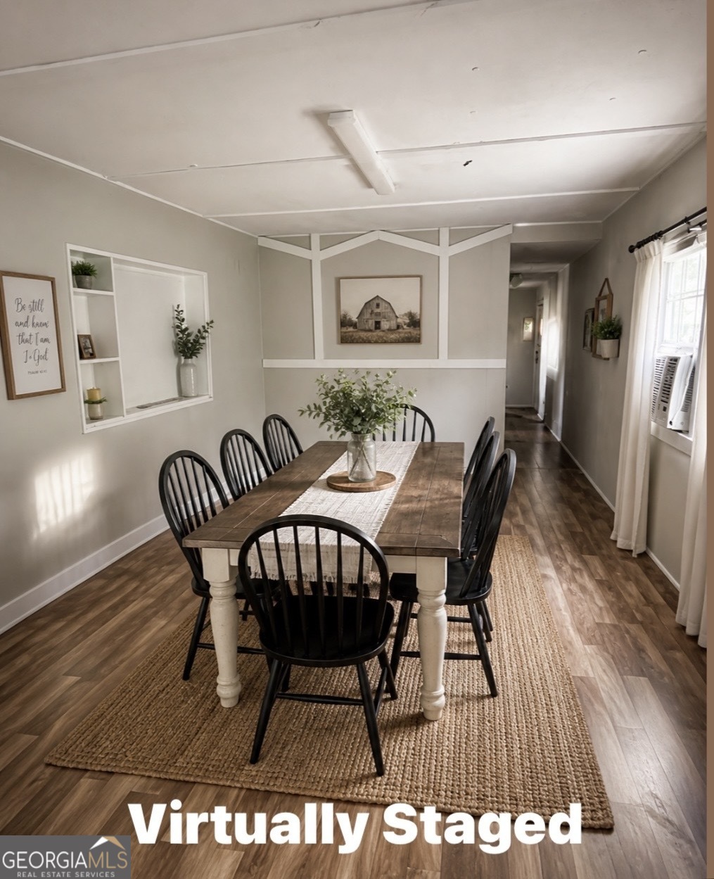 3195 Henderson Grove Road Sandersville, GA 31082 - Photo 33 of 50 a view of a dining room with furniture and wooden floor