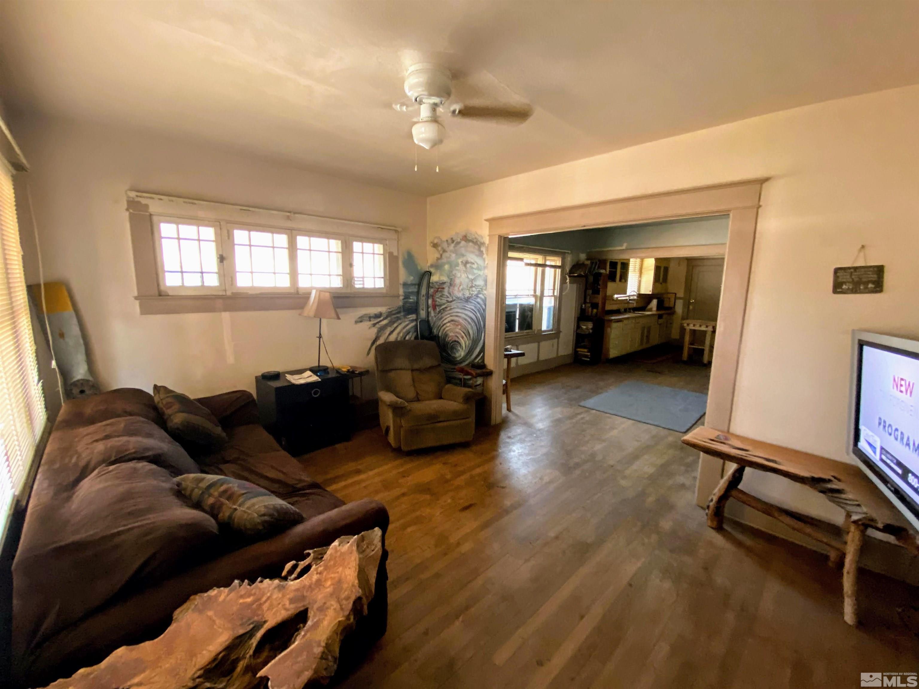 650 Spokane Street Reno, NV 89512 - Photo 3 of 25 a living room with furniture gym equipment and a window