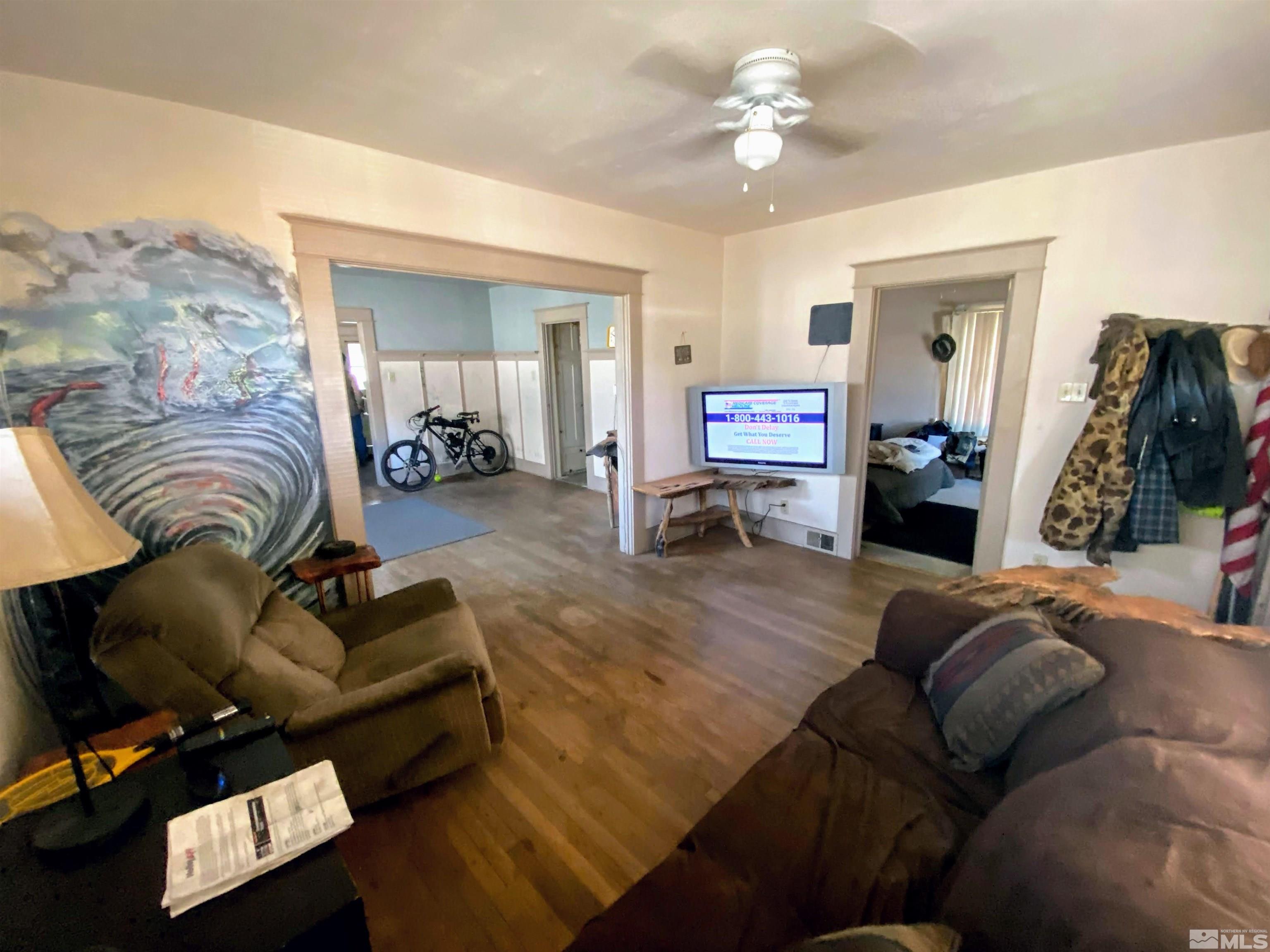 650 Spokane Street Reno, NV 89512 - Photo 4 of 25 a living room with furniture and a flat screen tv