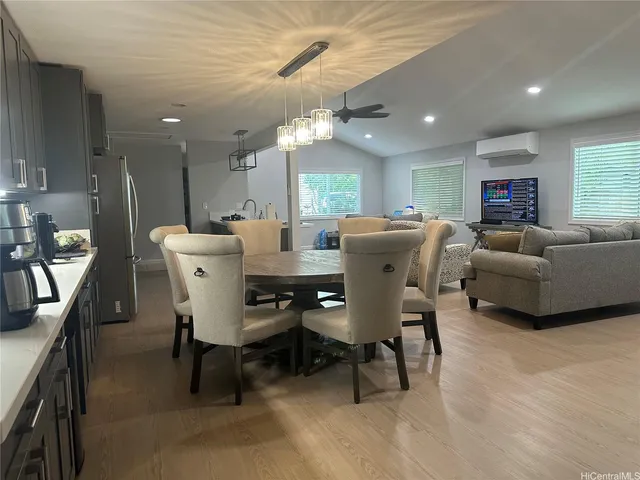 a view of a dining room with furniture