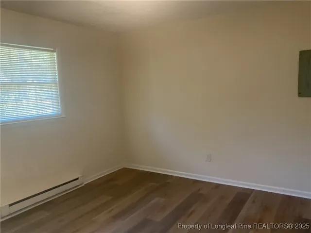 a view of a swimming pool with a yard