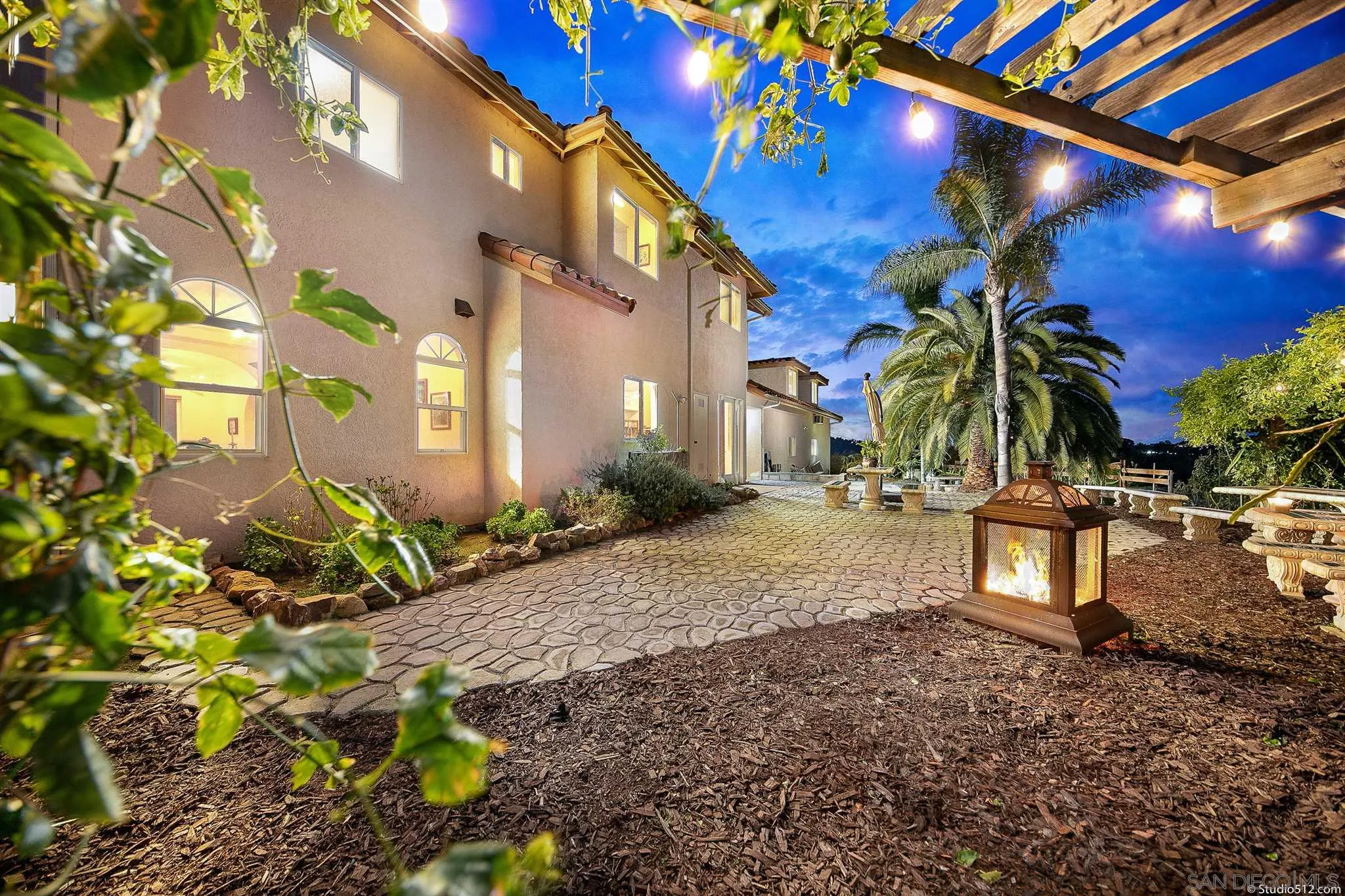 13190 Dermid Road Valley Center, CA 92082 - Photo 1 of 36 a view of a street with plants and trees
