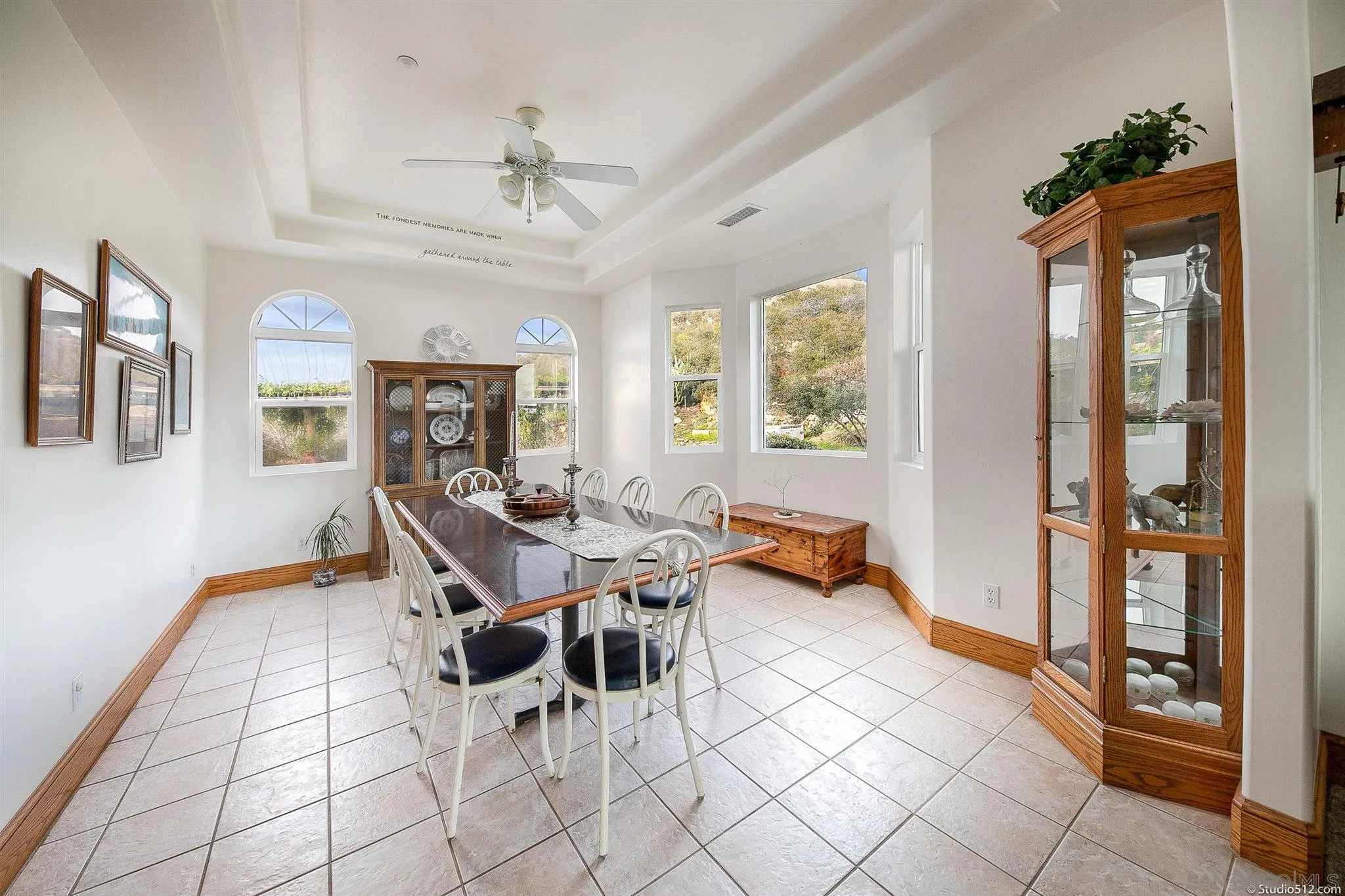 13190 Dermid Road Valley Center, CA 92082 - Photo 13 of 36 a living room with furniture a table and a large window