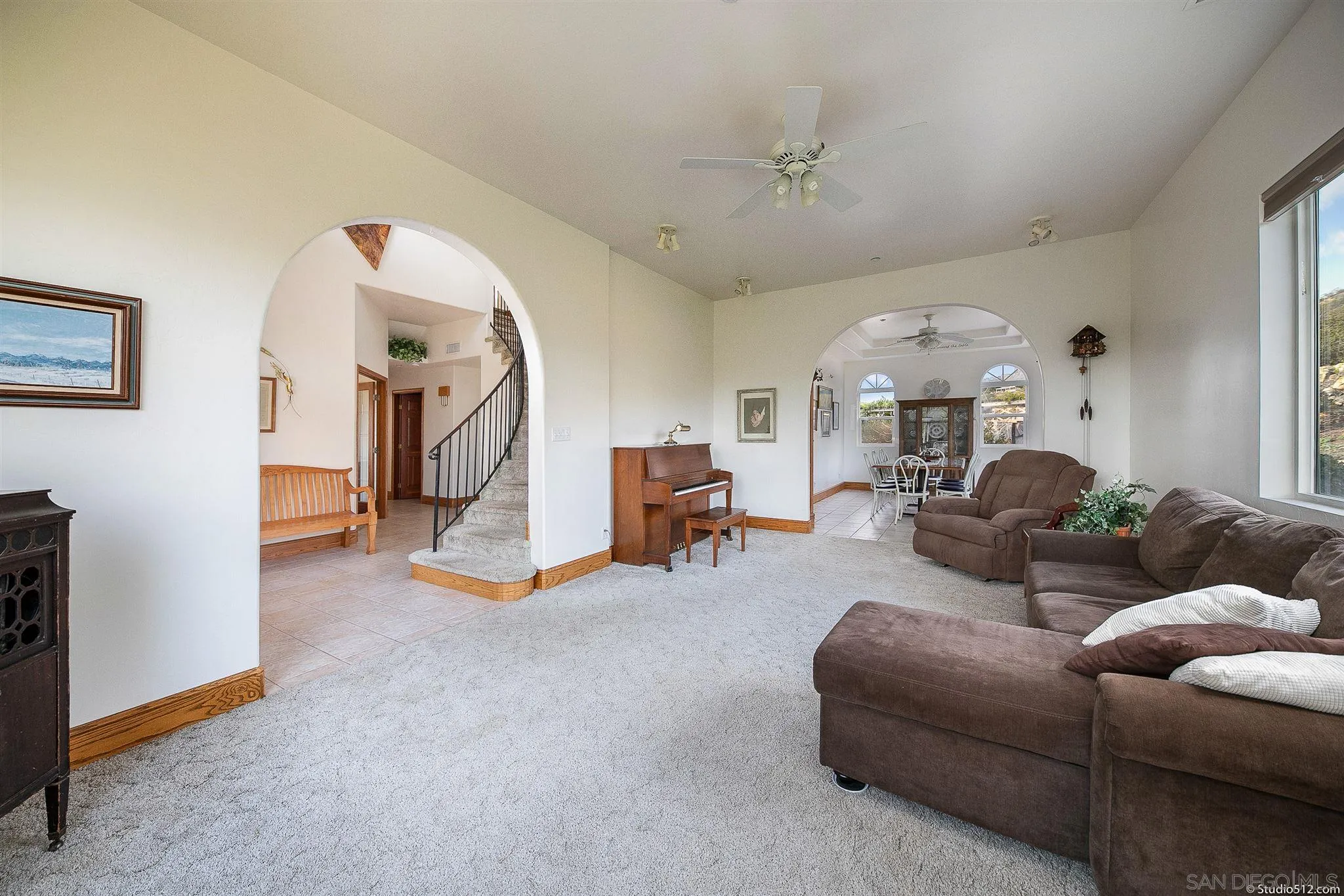 13190 Dermid Road Valley Center, CA 92082 - Photo 15 of 36 a living room with furniture and a chandelier
