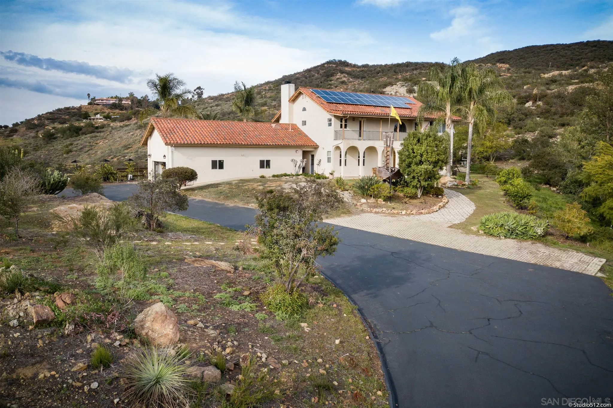 13190 Dermid Road Valley Center, CA 92082 - Photo 3 of 36 a view of a house with a yard