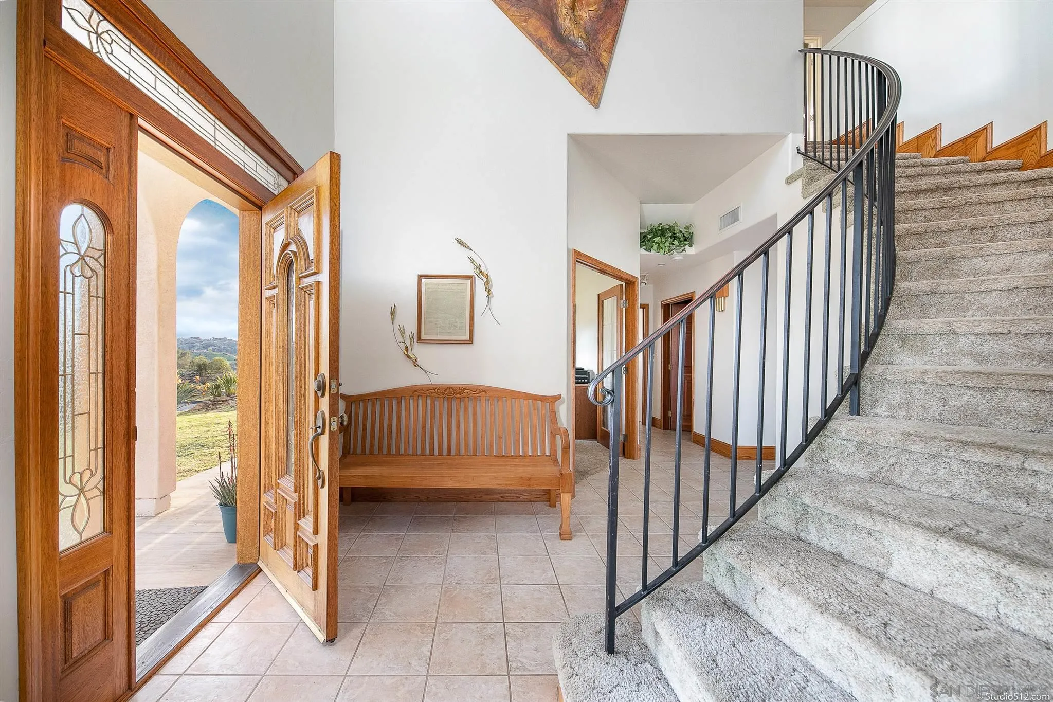 13190 Dermid Road Valley Center, CA 92082 - Photo 6 of 36 a view of a hallway with entryway wooden floor and windows