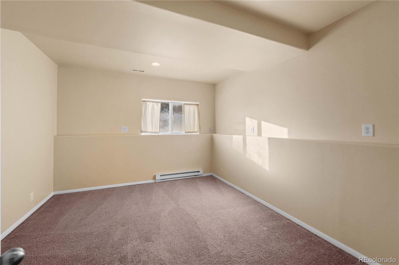 7191 Copper Gulch Road Cotopaxi, CO 81223 - Photo 44 of 50 an empty room with windows