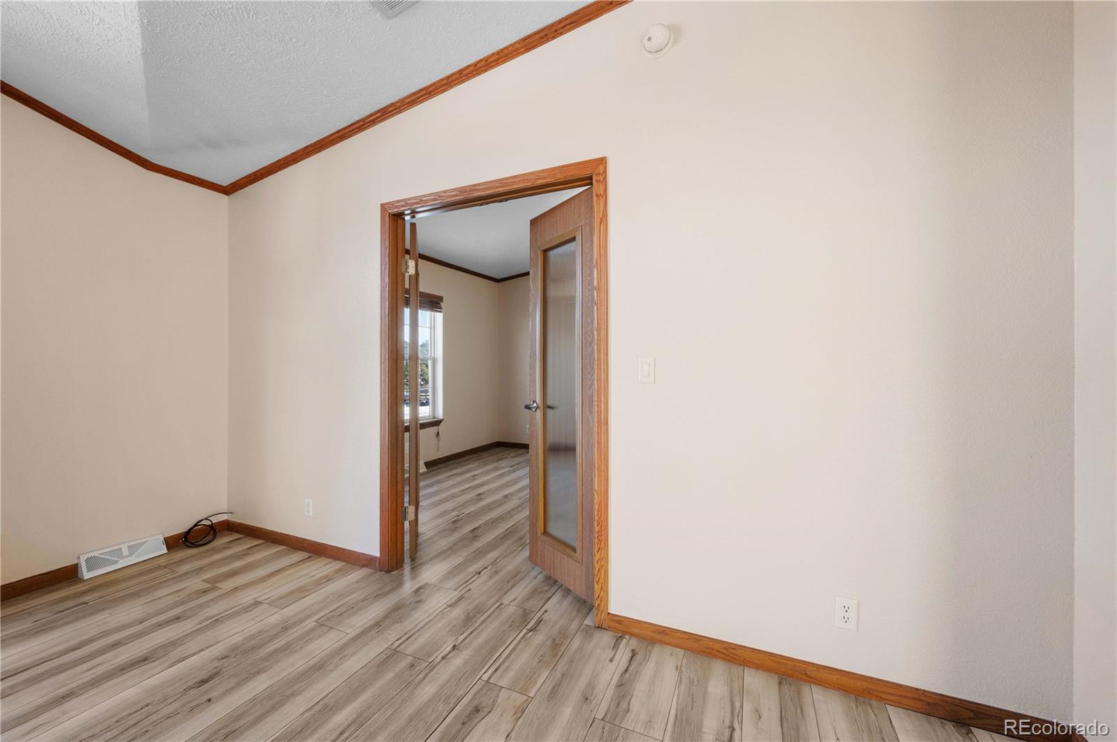 7191 Copper Gulch Road Cotopaxi, CO 81223 - Photo 9 of 50 a view of a hallway with wooden floor