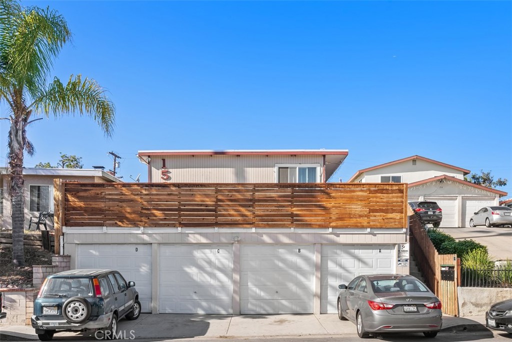 a view of a car parked in front of a house