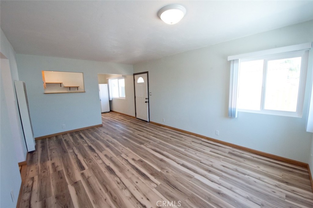 156 West Escalones San Clemente, CA 92672 - Photo 19 of 39 a view of a room with wooden floor and window