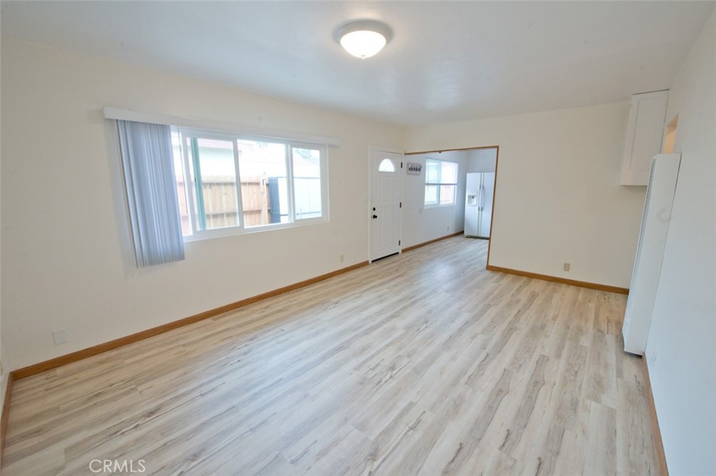 156 West Escalones San Clemente, CA 92672 - Photo 27 of 39 an empty room with wooden floor and windows