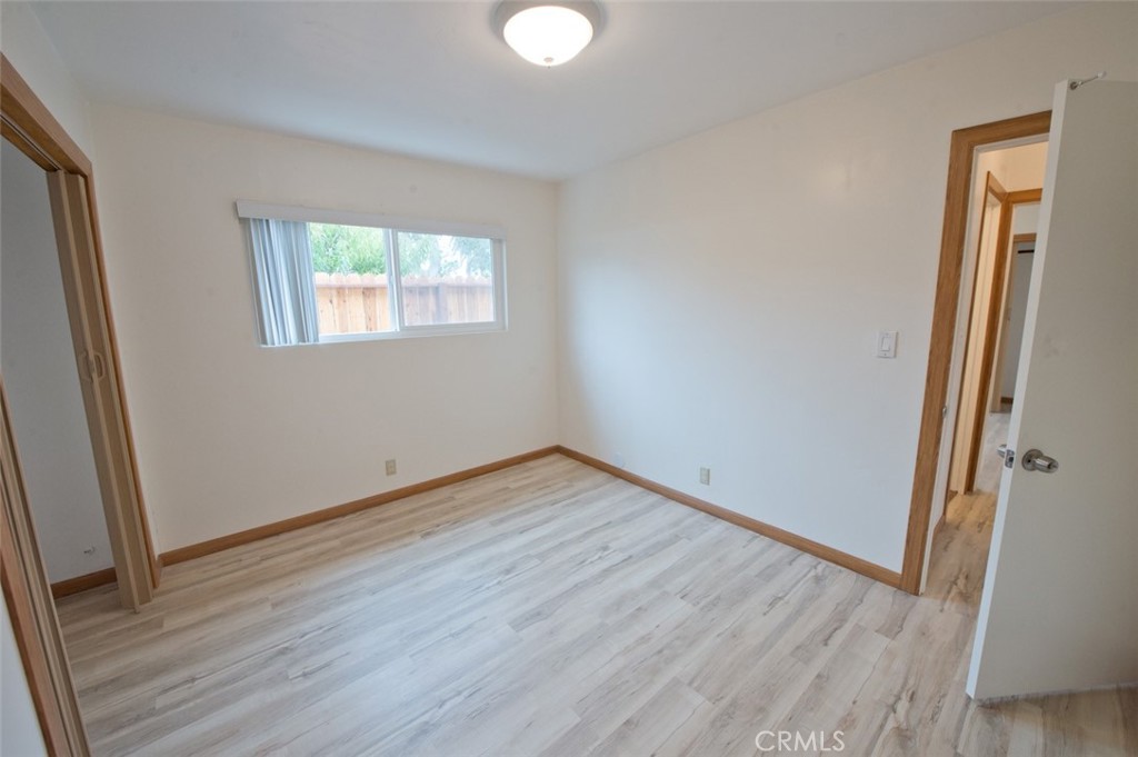 156 West Escalones San Clemente, CA 92672 - Photo 31 of 39 an empty room with wooden floor and windows